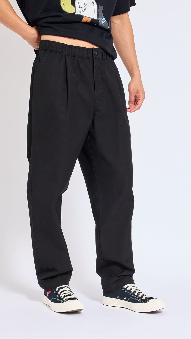 UNDERCOVER BLACK ELASTIC WAIST COTTON PANTS.