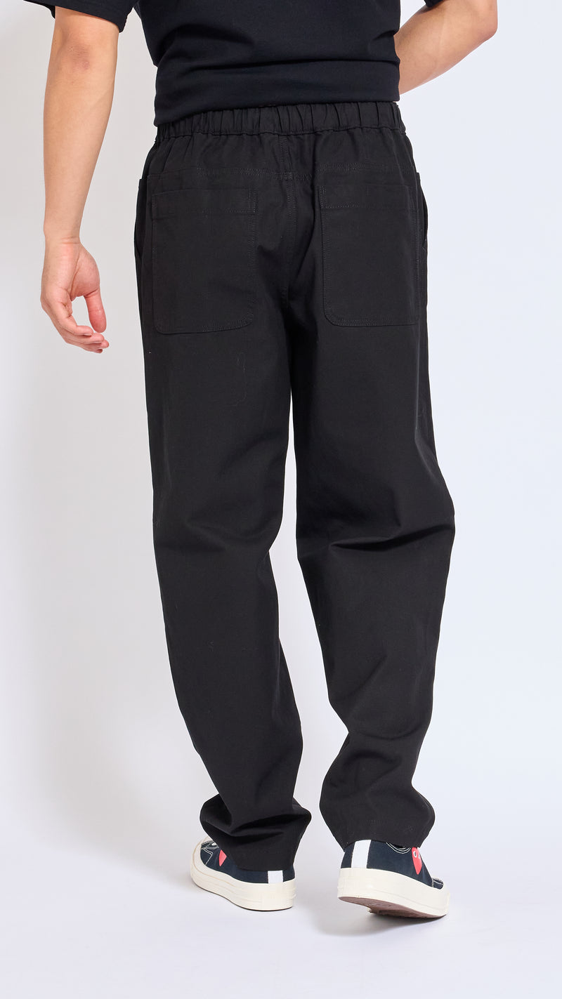UNDERCOVER BLACK ELASTIC WAIST COTTON PANTS.