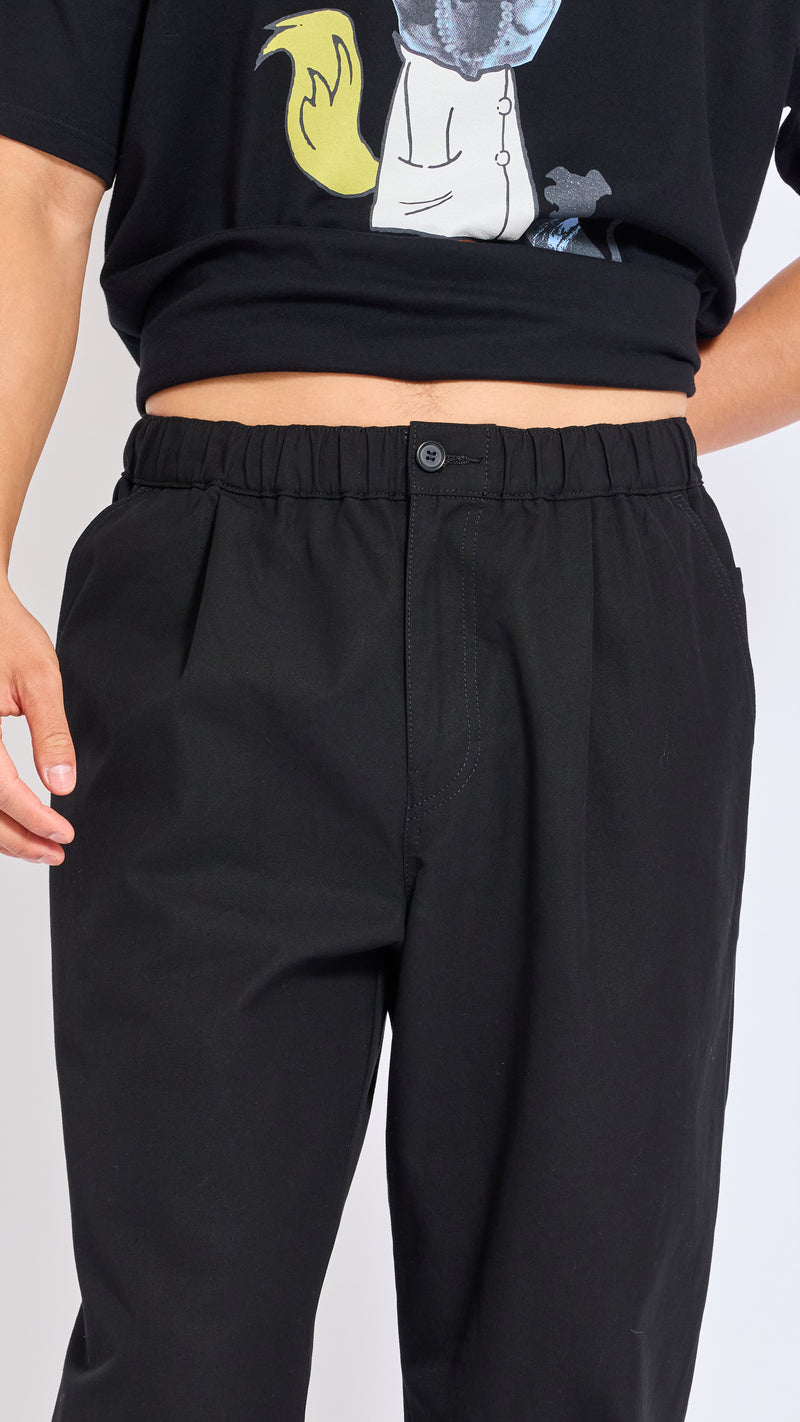 UNDERCOVER BLACK ELASTIC WAIST COTTON PANTS.