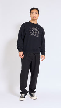 UNDERCOVER BLACK GRAPHIC SWEATSHIRT