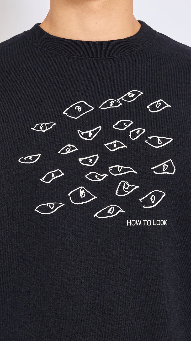 UNDERCOVER BLACK GRAPHIC SWEATSHIRT